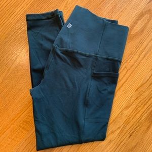 Athleta Salutation Stash Pocket 2 Tight 7/8 Green